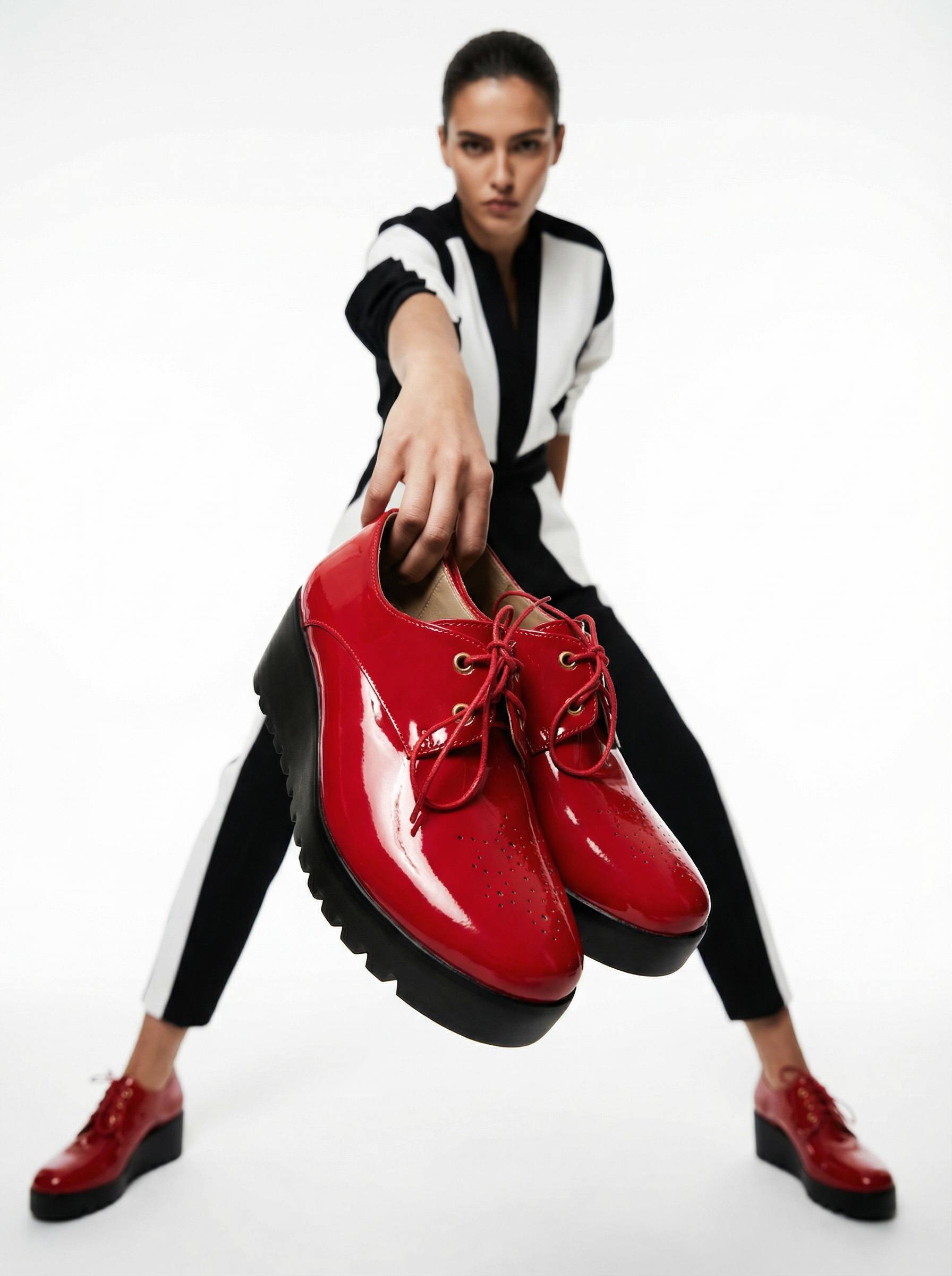 AI fashion template: model presenting red shoes